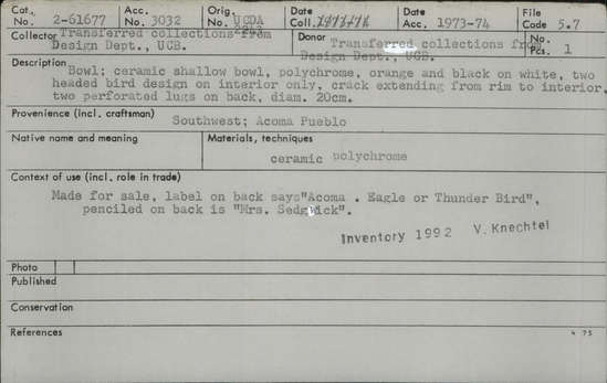 Documentation associated with Hearst Museum object titled Bowl, accession number 2-61677, described as Ceramic, shallow, polychrome, orange and black on white, two-headed bird design on interior only, crack extending from rim to interior, 2 perforated lugs on back. Label on back says "Acoma. Eagle or Thunder Bird", pencilled on back is "Mrs. Sedgwick".