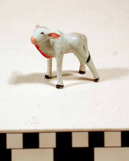 Hearst Museum object titled Toy cows, accession number 9-11044a-h, described as Toy cows (8); painted clay;  large, each:  7 cm. length; 2 1/2 cm. width; small, each: 5 1/2 cm. length; 2 cm. width