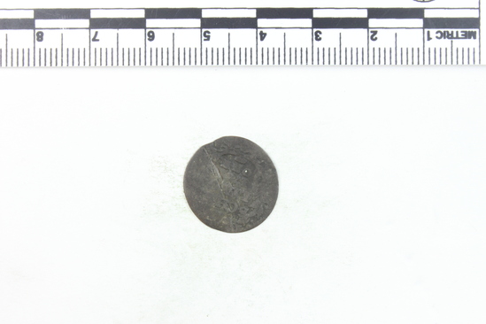 Hearst Museum object titled Coin, accession number 7-6149, described as Bronze coin. Weight .69 grams. Denomination: schilling. Obverse description: ? castle within wreath. Worn smooth, cracked. Reverse description: Letters within wreath- ? SCH...LIN... 17...