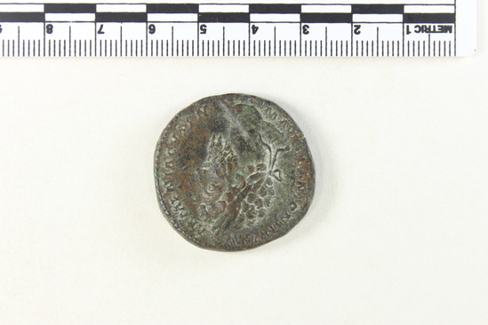 Hearst Museum object 5 of 7 titled Coin: æ sestertius, accession number 8-4020, described as Coin; AE; Sestertius; Roman. Marcus Aurelius, 165 AD. Rome, Italy. Obverse: M AVREL ANTONINVS AVG ARMENIACVS PM, Bust r. laureate. Reverse: TR POT XIX IMP III COS III, Providentia standing left holds wand over globe; S C.