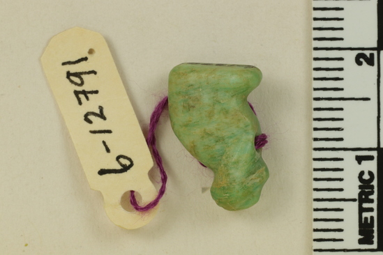 Hearst Museum object 3 of 3 titled Bead, accession number 6-12791, described as bead: small green glaze bird amulet