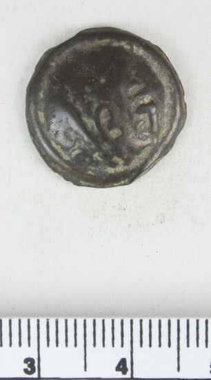 Hearst Museum object 4 of 6 titled Coin: æ, accession number 8-7827, described as Coin. Gallic, Cast Æ. (3.97 grams, 18 mm). Obverse: Head facing left. Reverse: Horse facing left.