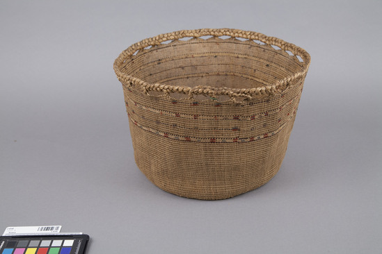 Hearst Museum object 2 of 2 titled Basket, accession number 2-4548, described as Plain twined, openwork. Ornamented with colored wool, braided edge.