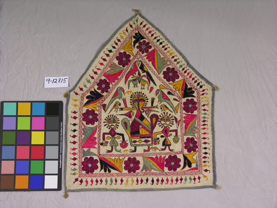 Hearst Museum object titled Mirror cloth, accession number 9-12815, described as Mirror cloth; white cotton embroidered with silk floss, gable shaped, many colored, border, Ganesh figure in center flanked by two anthropomorphic acolytes, measures 59 cm. x 48 cm.