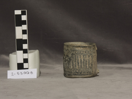 Hearst Museum object titled Mug, accession number 2-53008, described as Ceramic. Black on white decoration, painted geometric design, handle missing. Coiled and scraped.