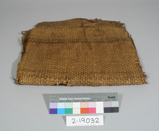 Hearst Museum object titled Mat, accession number 2-19032, described as Cedar bark, checker weave, ragged.