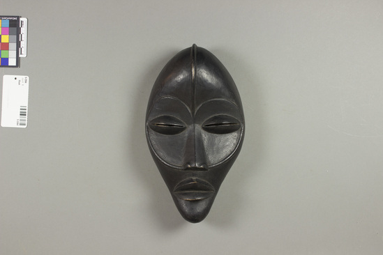 Hearst Museum object titled Mask, accession number 5-3364, described as Carved wooden face mask. Ovate; black.