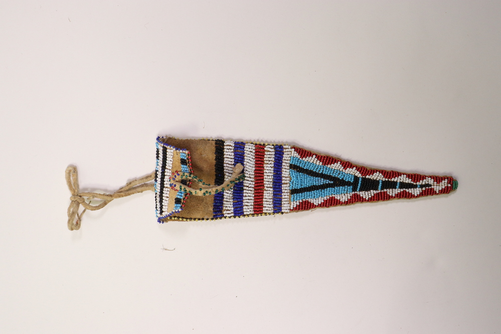 Hearst Museum object 4 of 4 titled Sheath, accession number 2-9377, described as Buckskin; beaded white/blue/black/red/green/yellow.  For knife.