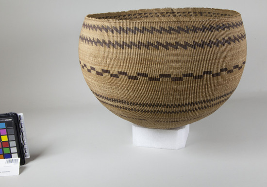 Hearst Museum object 2 of 2 titled Bowl basket, accession number 1-20856, described as Bowl basket; twined. Warp is Willow (Salix), weft is Sedge (Carex) and Pine (Pinus). Red pattern is Redbud (Cercis occidentalis). Black pattern is Sedge bark. In weave called "bamtuc."  Decorative pattern six red bands, one black.  Second origin. no. 371.