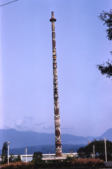 Hearst Museum object titled Color slide, accession number 25-6357, described as Totem pole at Hadden Park, Vancouver, with Maritime Museum in background.