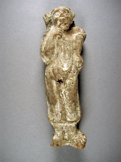 Broken harpocrates figurine