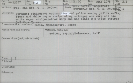 Documentation associated with Hearst Museum object titled Garment, accession number 9-13067, described as Plainweave yellow cotton garment with blue and yellow warps, yellow wefts and black and white rayon stripes along the selveges. One wrap end has white rayon stripes and the other has black and white stripes. Length 3.7 m, width 74 cm.
