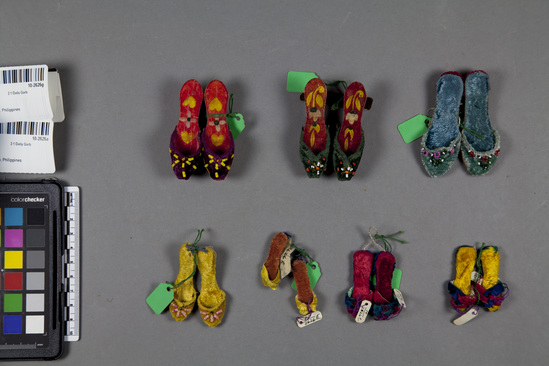 Hearst Museum object titled Model slippers, accession number 10-2626a-g, described as Small models of women's slippers