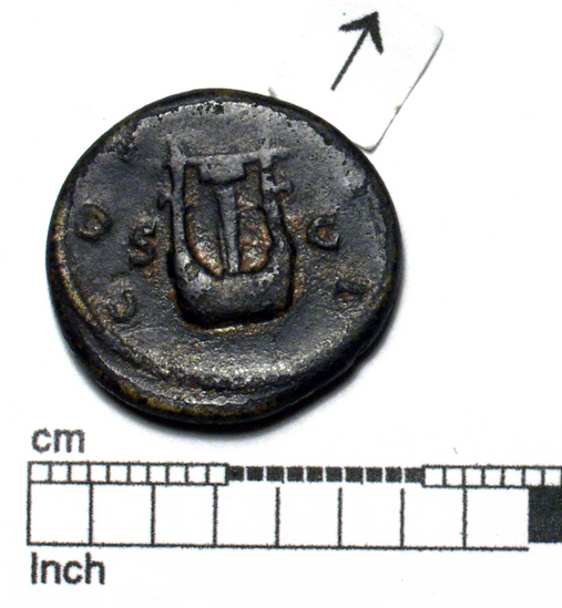 Hearst Museum object 4 of 14 titled Coin: æ semis, accession number 8-8133, described as Coin; Æ; aes grave; semis; Orichalcum. 3.751 grams. Obverse: Head of Hadrian, facing right. Reverse: S C flanking object.