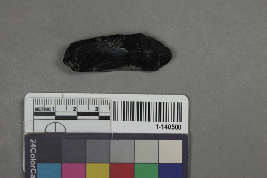 Hearst Museum object 1 of 2 titled Flake, accession number 1-140500, described as obsidian flake