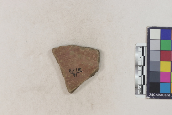 Hearst Museum object titled Potsherd, accession number 16-8179, described as Potsherd: body, red slip Section of Manta on beach currently inhabited. Numbers  8111 to 8194 are sherds picked up on beach at low tide.