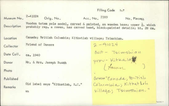 Documentation associated with Hearst Museum object titled Totem pole model, accession number 2-41024, described as Wooden totem pole model, carved and painted, on wooden base; upper half, which probably represents a raven, has carved head, black-painted details. Old label says "Kitkatlah, B.C.".