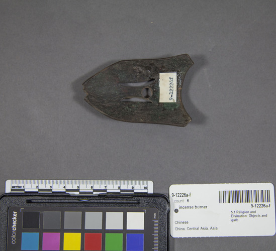 Hearst Museum object 16 of 16 titled Incense burner, accession number 9-12226a-f, described as Three phoenixes on stand, cast bronze and cloisonne. A) 3-lobed stand, edge has openwork design with stylized floral motif, 1 phoenix soldered in place, width 37.5 cm, height 31.5 cm; B) wing, bronze, and cloisonne, length 14.4 cm; C) bronze and cloisonne  phoenix, beak to tail length 29.7 cm; D) wing, bronze and cloisonne, length 14.6 cm; E) bronze and cloisonne phoenix, beak to tail length 24.3 cm; F) lid, bronze, length 8.2 cm