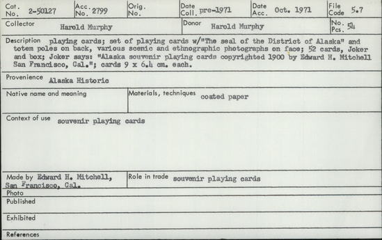 Documentation associated with Hearst Museum object titled Playing cards, accession number 2-50127, described as Playing cards; set of playing cards with “The seal of the District of Alaska” and totem poles on back, various scenic and ethnographic photographs on face; 52 cards, Joker and box; Joker says: “Alaska souvenir playing cards copyrighted 1900 by Edward H. Mitchell San Francisco, Cal.”: cards 9 x 6.4 cm each.