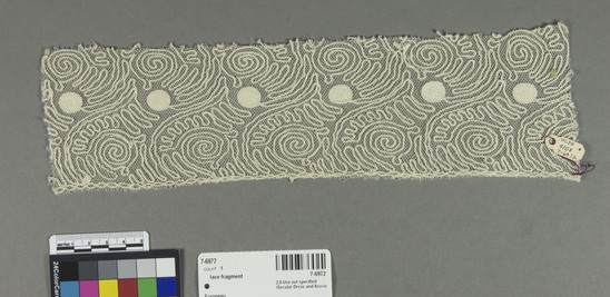 Hearst Museum object titled Lace fragment, accession number 7-6972, described as Lace. Embroidered net.