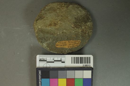 Hearst Museum object titled Hammerstone, accession number 2-58513, described as mano, gray basalt, irregular shape, slightly modified by pecking around the periphery; wear pattern on one face only.  7.8 cm. length