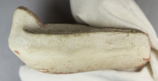 Hearst Museum object 12 of 12 titled Oil lamp, accession number 8-7575, described as Oil Lamp; orange, short stub, stamped with braid design