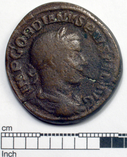 Hearst Museum object 1 of 8 titled Coin: æ sestertius, accession number 8-5924, described as Coin: Sestertius; Æ; Gordianus.Pius - 21.13 grams. Rome, 240-244 AD. Obverse: IMP GORDIANVS PIVS FEL AVG - bust facing right, laureate, draped, cuirassed. Reverse: IOVI STATORI, SC - Jupiter standing facing left, holds long scepter and thunderbolt.