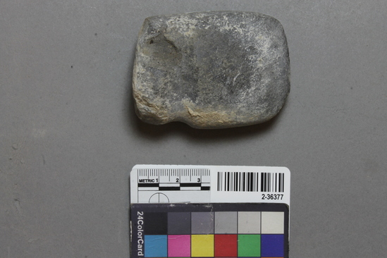 Hearst Museum object titled Axe fragment, accession number 2-36377, described as Small 3- quarter grooved stone axe.