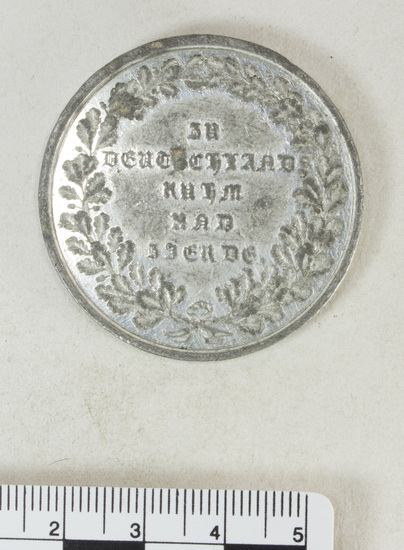 Hearst Museum object titled Coin: billon 2 taler, accession number 7-6201, described as Bavaria coin (German States), billon, two talers, obverse inscribed "WALHALLA" building on terrace, below "1842", reverse legend in German schrifft within wreath (to commemorate completion of a copy of the Parthenon), date 1842.