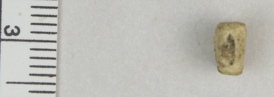 Hearst Museum object titled Fragment, accession number 5-13185, described as Fragment, heavily eroded, very faint designs with bars at top and bottom with striations between, 1 cm square.