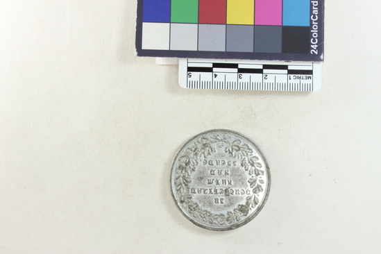 Hearst Museum object 2 of 4 titled Coin: billon 2 taler, accession number 7-6201, described as Bavaria coin (German States), billon, two talers, obverse inscribed "WALHALLA" building on terrace, below "1842", reverse legend in German schrifft within wreath (to commemorate completion of a copy of the Parthenon), date 1842.