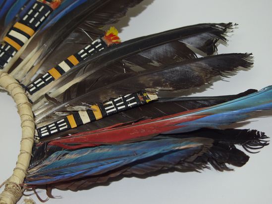 Hearst Museum object titled Feathered object, accession number 16-20088, no description available.