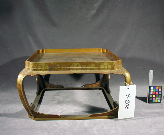 Hearst Museum object titled Stand, accession number 9-208, described as Japanese gold lacquer stand, square, four legs and hollow square base, 14 by 14 inches