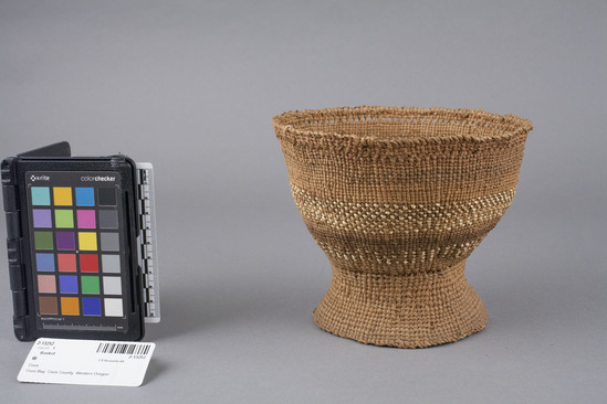 Hearst Museum object 3 of 3 titled Basket, accession number 2-13252, described as Tule, shaped like egg cup. Close twining with banded light and dark design.