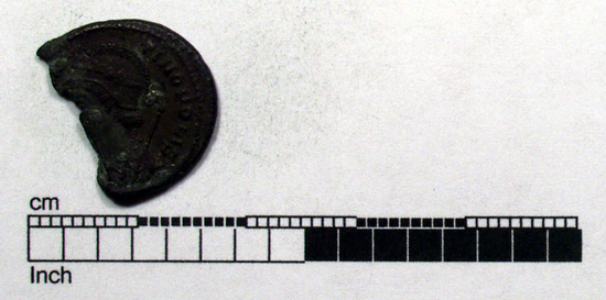 Hearst Museum object titled Coin: æ, accession number 8-6095, described as Coin: Æ; CONSTANTINOPOLIS [approximately symbol] 1.74 grms. Obverse: [CONS]TANTINOPOLIS - Bust facing left, helmeted and cuirassed. Reverse: Victory walking, facing left, holding scepter, foot on prow, shield behind.