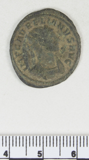 Hearst Museum object 4 of 8 titled Coin: billon antoninianus, accession number 8-6012, described as Coin: Antoninianus; AR [?], Æ; Aurelianus - 3.03 grams. Obverse: IMP C AVRELIANVS AVG - Bust facing right radiate, cuirassed. Reverse: CONCORDIA MILITVM -  Emperor and Concordia clasping hands, [untranscribable symbols].