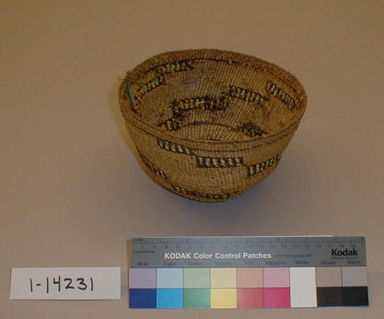 Hearst Museum object titled Basketry cap, accession number 1-14231, described as Small deep basket, cap. Diagonal rows of narrow reddish and yellow rectangles.