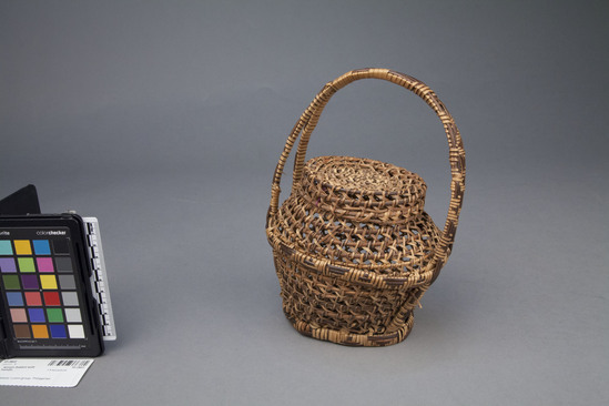 Hearst Museum object titled Woven basket with handle, accession number 10-2603, no description available.