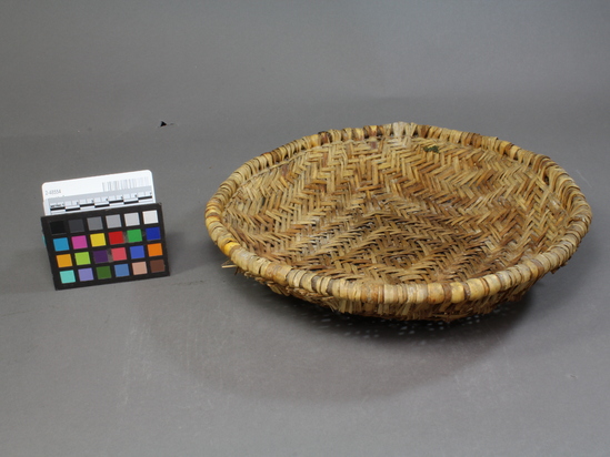 Hearst Museum object 3 of 3 titled Bowl, accession number 2-48554, described as Basketry bowl, ground, twilled yucca leaves.