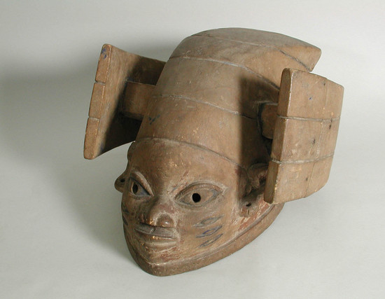 Hearst Museum object titled Mask, accession number 5-14940, described as Gelede Mask, (Save, 1944); Head of a woman with cloth head-tie; unstained buff colored wood. Broken end.H at back = 16.5cm