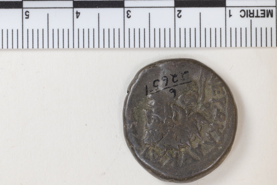 Hearst Museum object 6 of 6 titled Coin: billon tetradrachm, accession number 6-22651, described as Obverse; Head of Nero, right, laureate.  Reverse; Bust of Serapis, right.  To right [LI]