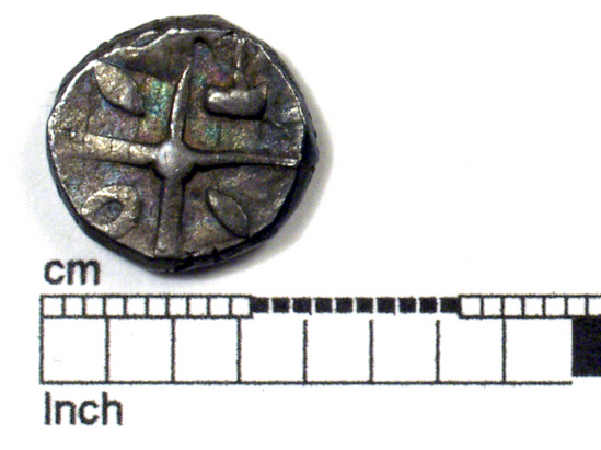 Hearst Museum object titled Coin: ar, accession number 8-7824, described as Coin. AR. Celt-Iberian (?). Similar to 8-4474a (2.98 grams; 13 mm.) 2nd-1st Century BC. Obverse: Barbarous head facing left. Reverse: cross; hammer, annulet and two almonds in angles.