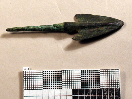 Hearst Museum object titled Arrowhead, accession number 9-16770, described as Arrowhead. Barbed deltoid blade, raised mid-rib; round tang tapering to point. L. 62 cm.; L. of tang 3.0 cm.  Green patina. Arrowheads of the deltoid form are widely distributed in Western Persia from the late 2nd Early 1st millennium B.C. aand are presursors of the winged arrowheads which have the same distribution: Persian Talish, Dailaman, Marlik, Amlash, Khurvin; in Kurdistan Bit Sorgh; cemetery B from Sialk and in Lursitan.