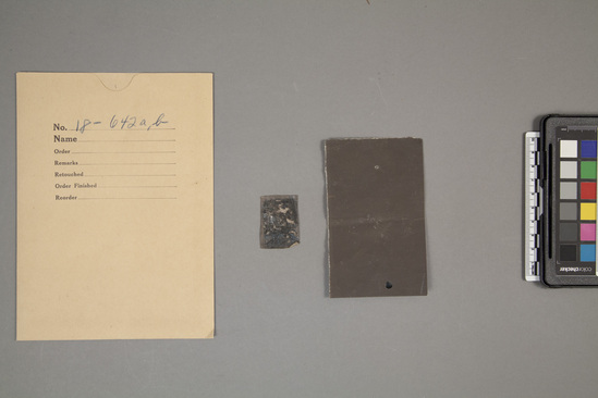 Hearst Museum object titled Emery paper, accession number 18-642a,b, described as “Crocus cloth” emery paper 5/0. (a) Unused piece. 11.5 x 7.2 cm. (b) Used piece. 3 x 4 cm. Used to polish gold.
