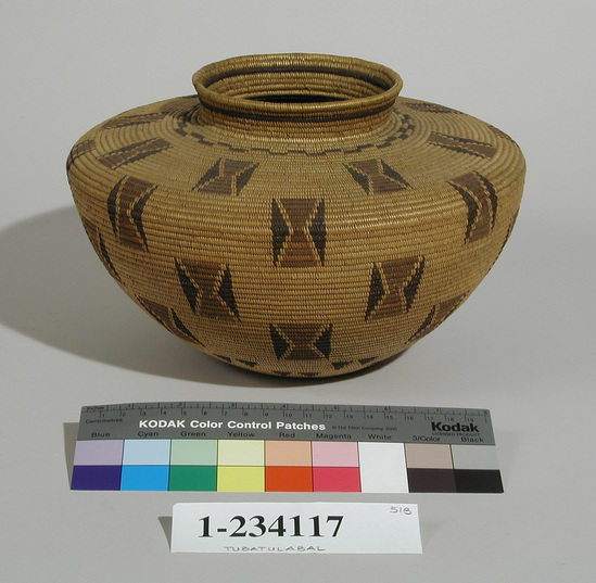 Hearst Museum object 1 of 2 titled Basket, accession number 1-234117, described as Money basket"; coiled.  Rectangles with brown and red designs on straw-colored ground.