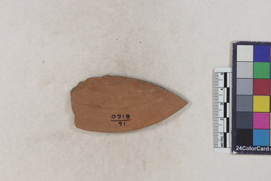 Hearst Museum object titled Potsherd, accession number 16-8160, described as Potsherd; rim, red paint, published Section of Manta on beach currently inhabited. Numbers  8111 to 8194 are sherds picked up on beach at low tide.