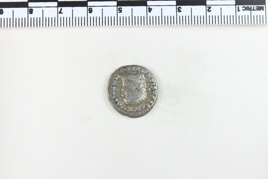 Hearst Museum object 5 of 8 titled Coin: denarius, accession number 8-5637, described as Coin. Roman. Denarius. (    gms.; 18 mm.) Titus, AD. 80, Rome. Obverse: IMP TITVS  CAES   VESPASIAN AVG  P M   Head facing right, laureate. Reverse: TR P IX   IMP XV  COS  VIII   P P   Winged thunderbolt on draped altar.