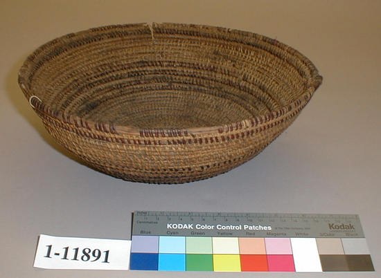 Hearst Museum object titled Cooking basket, accession number 1-11891, described as Hemispherical coiled basket of very open stitch.  Tag: "Yuki". Per Ralph Shanks:  Coiled flaring basket bowl, with widely spaced wefts.  The basket has some food residue but no signs of cooking; it is possibly a serving bowl.  The basket has a knotted start.  The coil foundation is three rods of peeled shoots with some splints.  The wefts are peeled redbud with unpeeled redbud designs.  The design is horizontal bands of unpeeled redbud.  There is one random rectangle. The rim is plain wrapped and the coil ending is slightly tapered with three diagonal backstitches.  The rim is sliced by someone after it entered in the museum. The weft fag ends are primarily bound under.  The weft moving ends are primarily bound under.  The exterior has below 5% split stiches.  The interior of the basket has below 20% split stiches.  The basket has an exterior workface with a rightward work direction and a down to the right slant of weft twist.