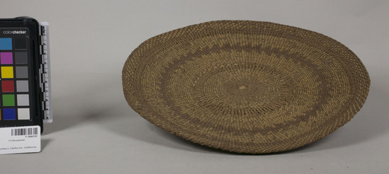 Hearst Museum object 2 of 4 titled Basket, accession number 1-164131, described as Twined acorn meal sifting plaque.