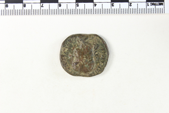 Hearst Museum object 2 of 8 titled Coin: æ sestertius, accession number 8-6355, described as Coin: Sestertius; Æ; Philip I (?) - 15.02 grms. Obverse: IMP MI ... AVG - Bust facing right laureate, draped. Reverse: LIBERTA[LITAS A]VGG - III, SC in exergue - Philip I and II seated facing left on curule chairs, each holding scepter and abacus.